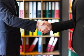 Shaking hands with employee