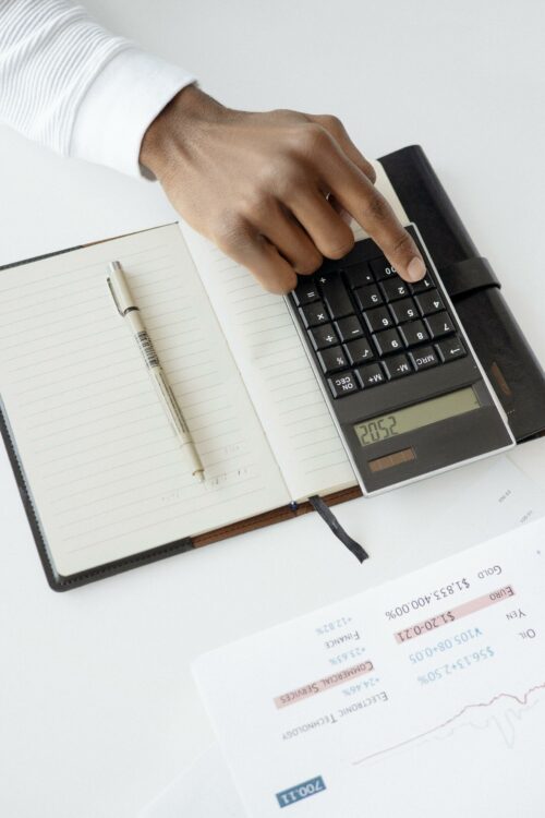 Person using Black Calculator