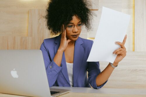 Woman reading r&d tax repayments