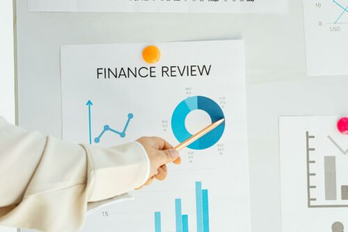 Person reviewing finances after learning what financial statements are important to investors