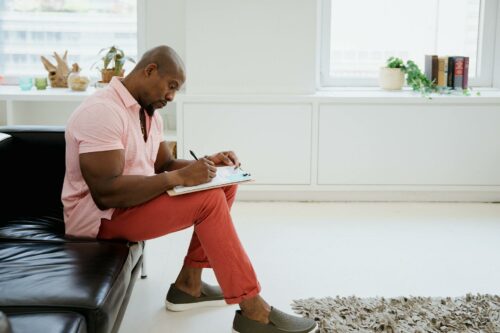 Man figuring out corporation tax for a limited company